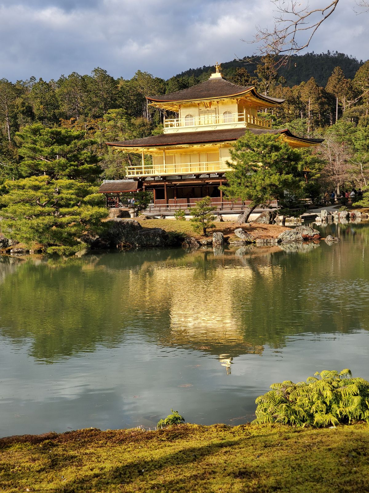 Kinkaku-ji temple reflecting in Kyoko-chi pond in Kyoto, Japan