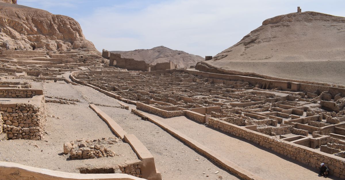 Explore the historic ruins of Deir el-Medina, an ancient village in Egypt's desert landscape.