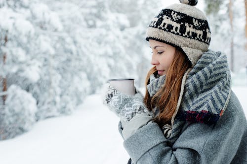 Photo Of Woman Wearing Knitted Sweater