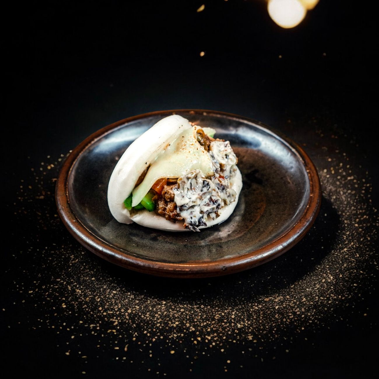 Photo by Patrick Bryan on Pexels Dining room with warm lighting and plated dishes
