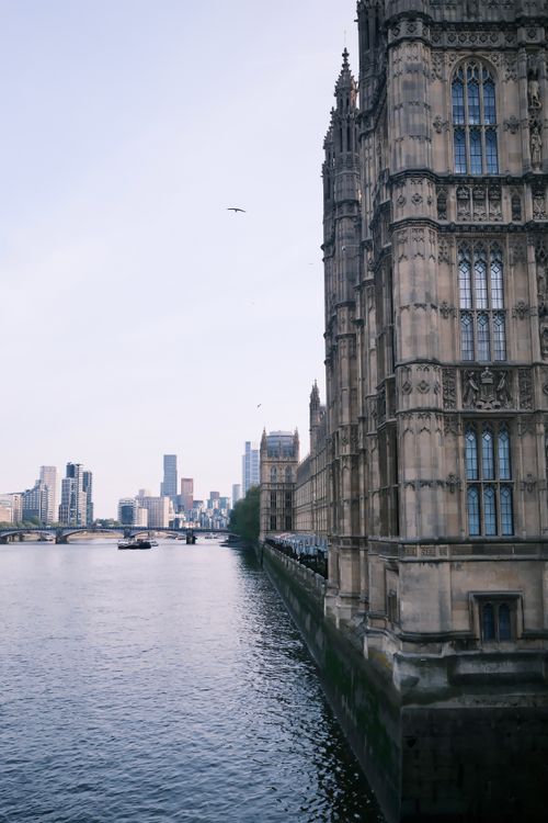 Free Historic Westminster architecture with London skyline view along the Thames River. Stock Photo