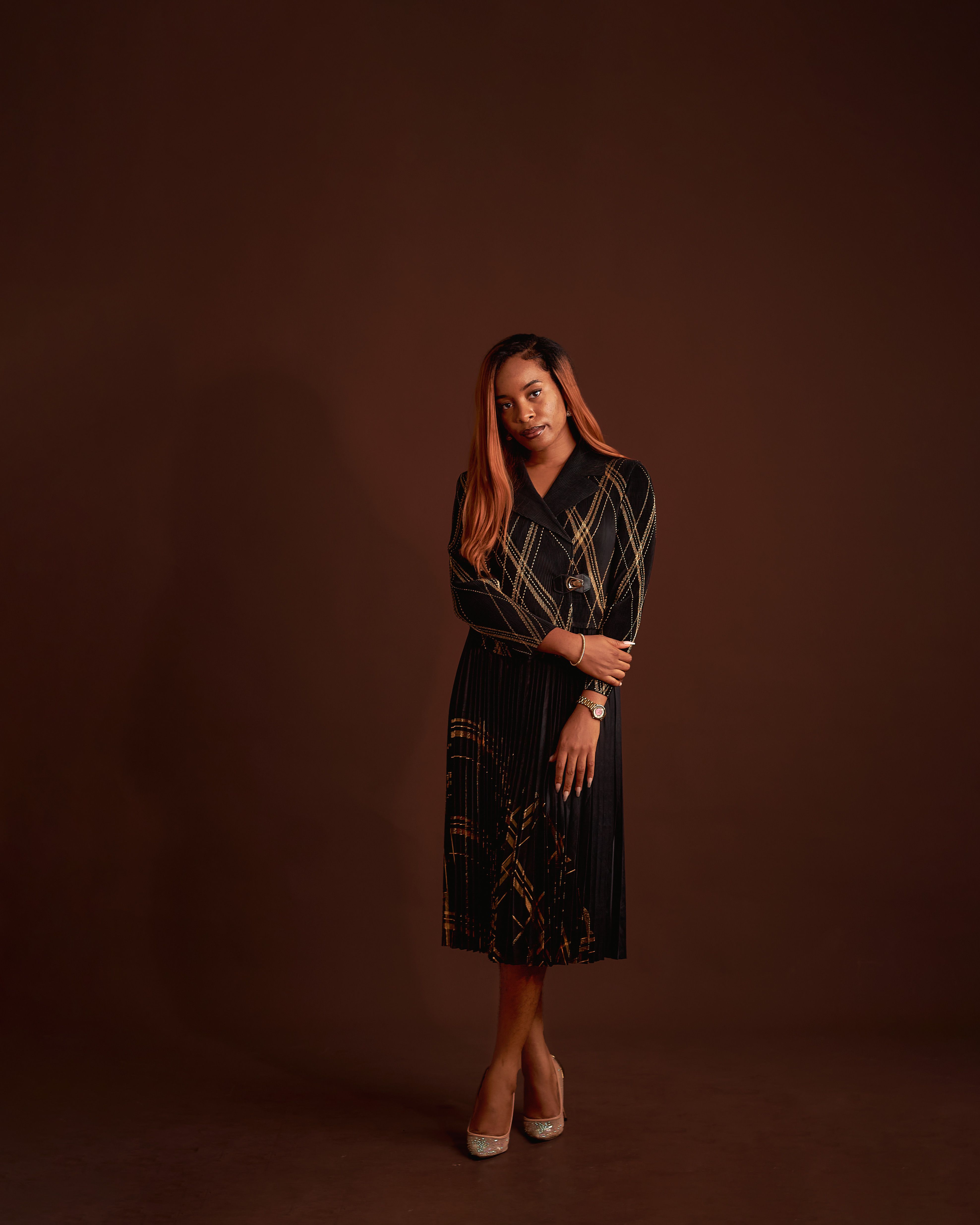 Elegant Woman in Stylish Black Dress Posing · Free Stock Photo