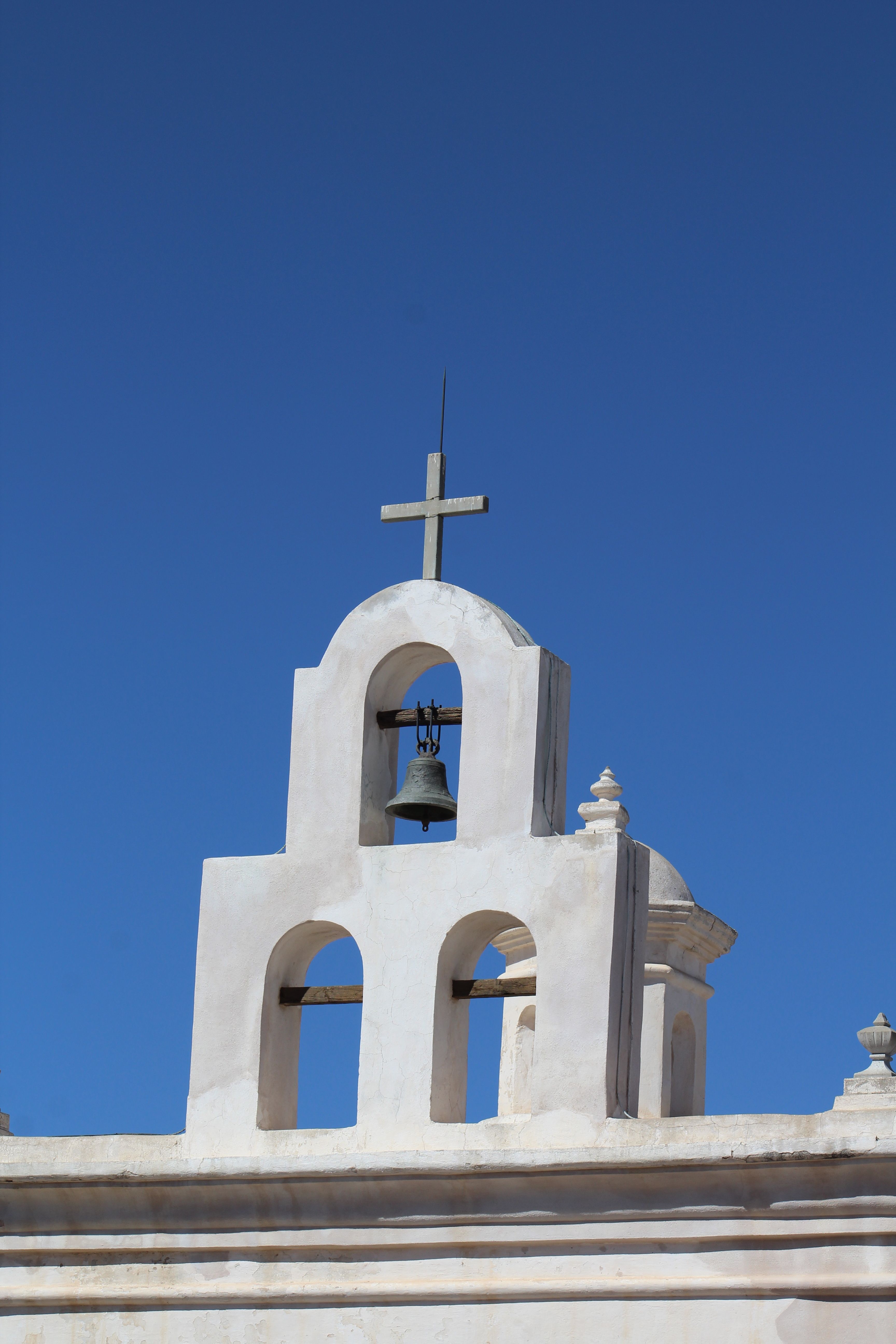 White Church Bell Tower Against Blue Sky · Free Stock Photo