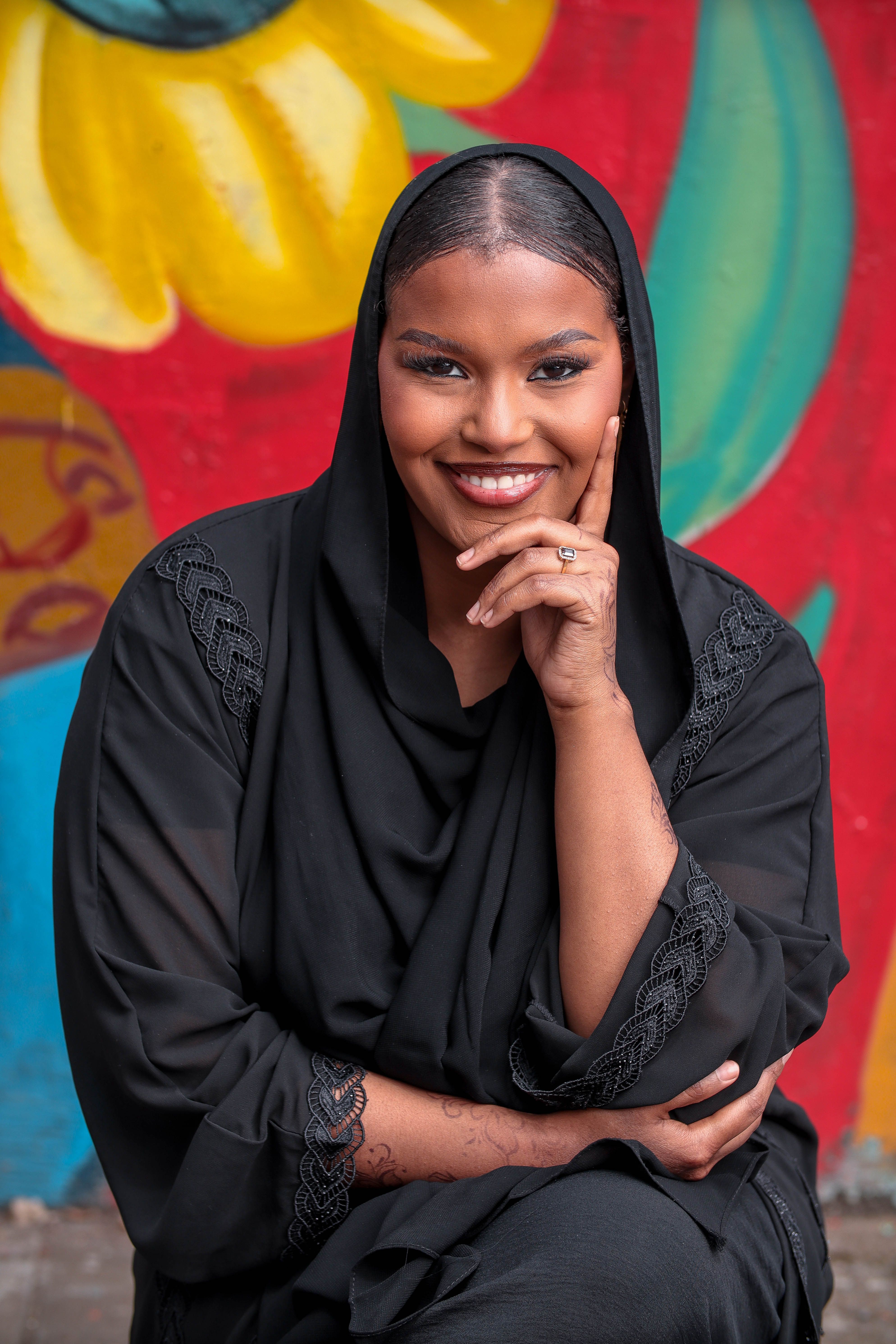 Portrait of Smiling Woman in Traditional Attire · Free Stock Photo