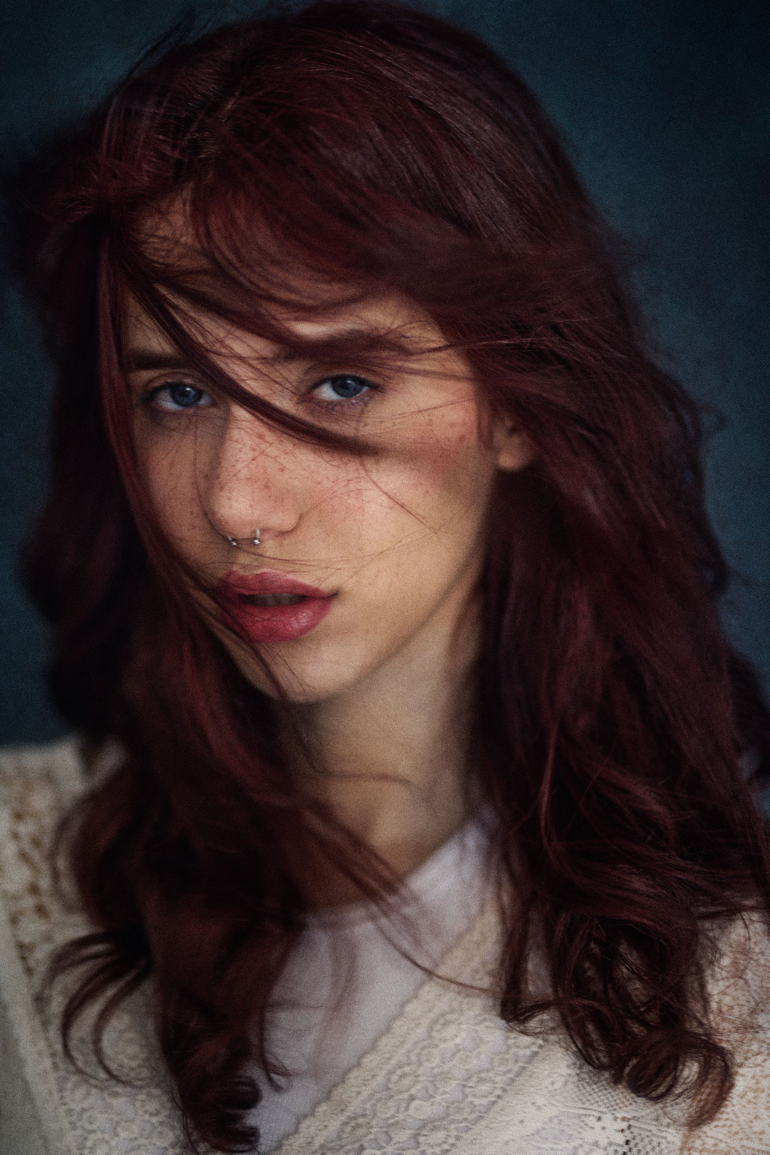 Portrait of a Young Woman with Freckles and Red Hair · Free Stock Photo