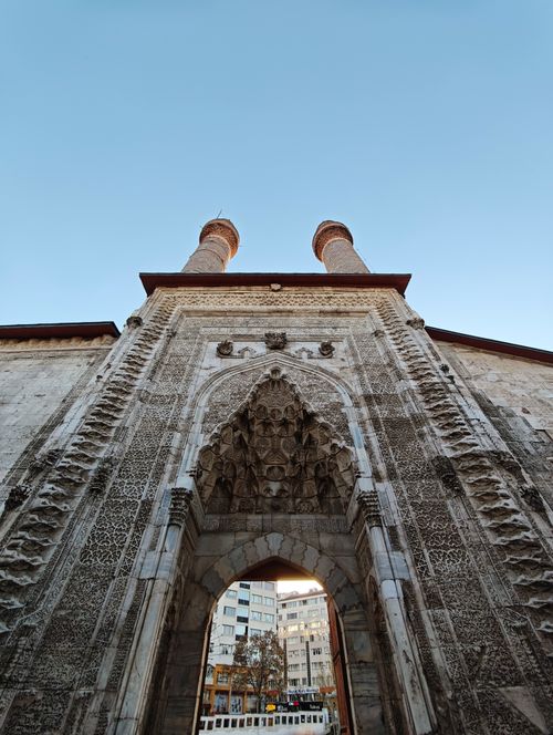 Free Impressive facade of the Twin Minaret Madrasa with intricate stone carvings in Sivas, Turkey. Stock Photo