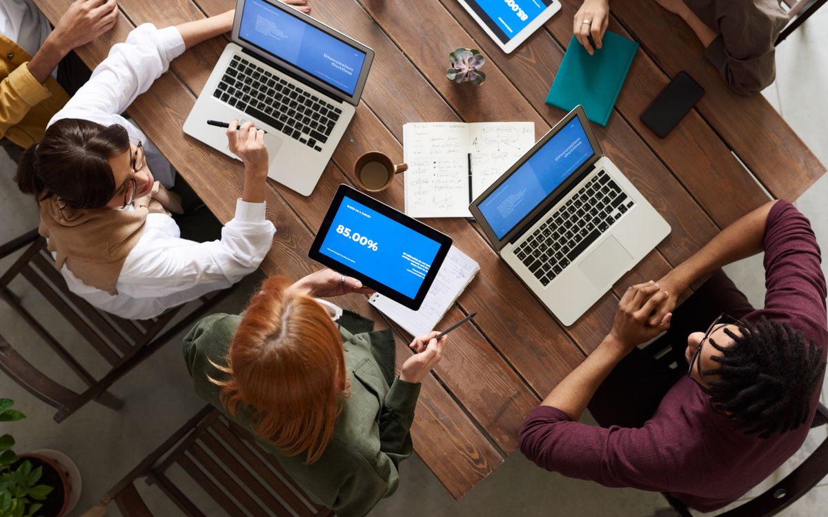 Team reviewing project plans in a meeting