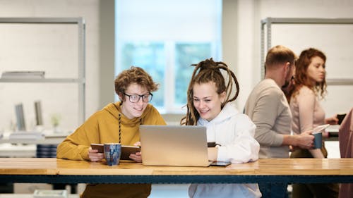 Photo Of Women Looking On Laptop