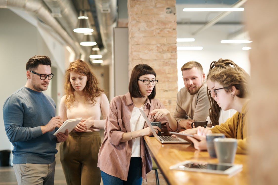 happy employees in a tidy office