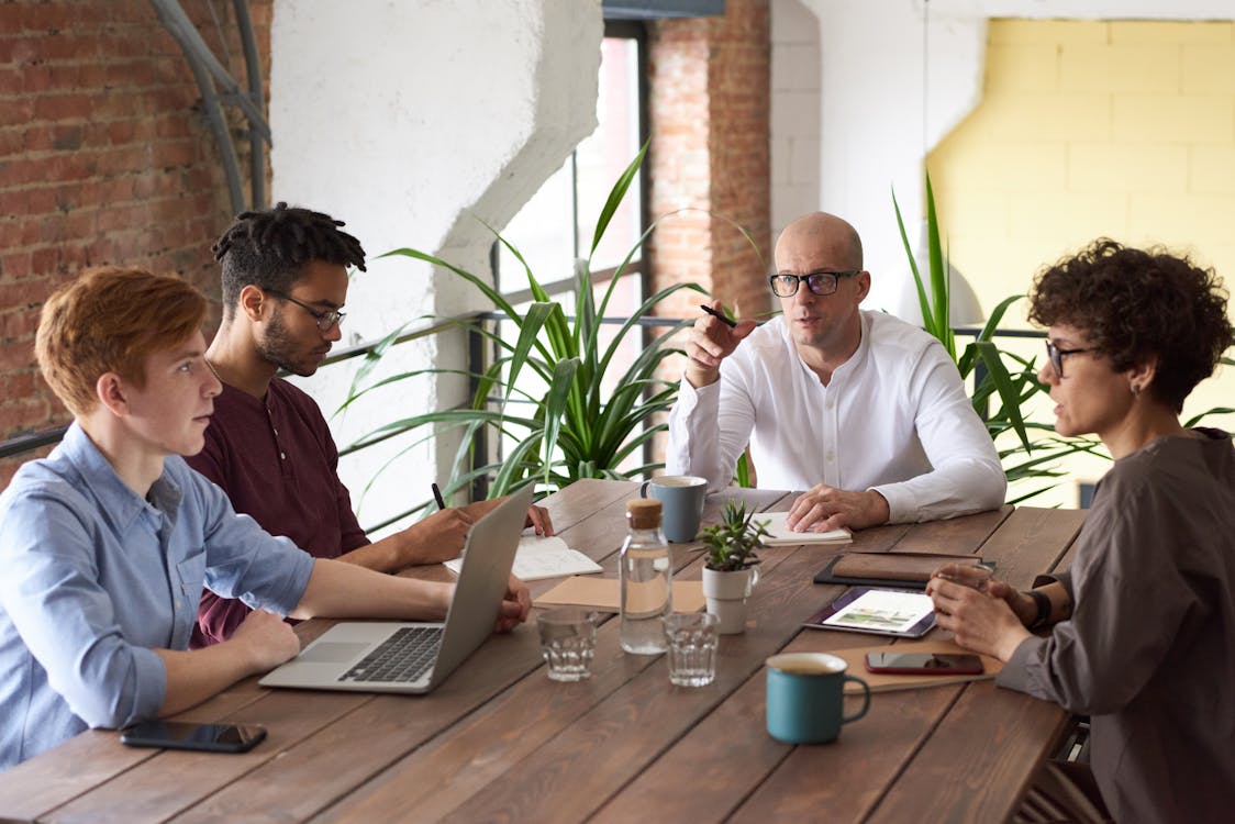 People engaged in a work discussion