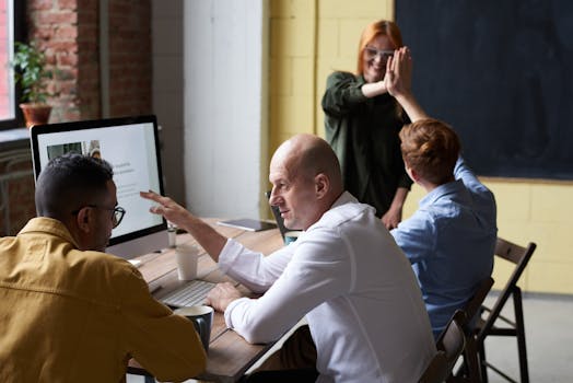Diverse team of professionals engaging in a collaborative meeting inside a modern office space.