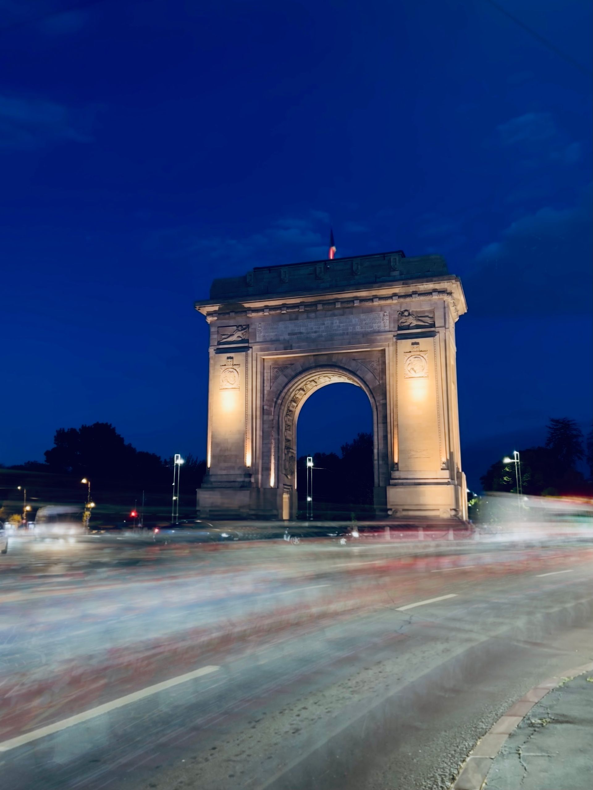 Arcul de Triumf in Bucharest at night.