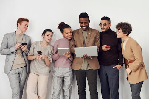Free Group of People Looking at Laptop Screen Stock Photo