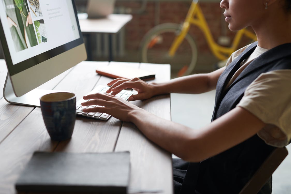 Photo Of Person Using Computer