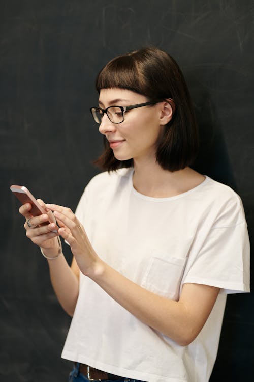 Photo Of Woman Holding Smartphone