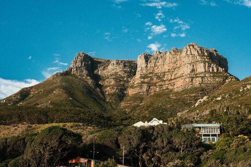 Free Scenic view of the Twelve Apostles mountain range under a clear blue sky in Cape Town, South Africa. Stock Photo