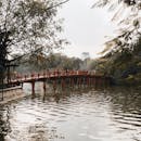 Iconic Red Bridge in Hanoi, Vietnam Reflection
