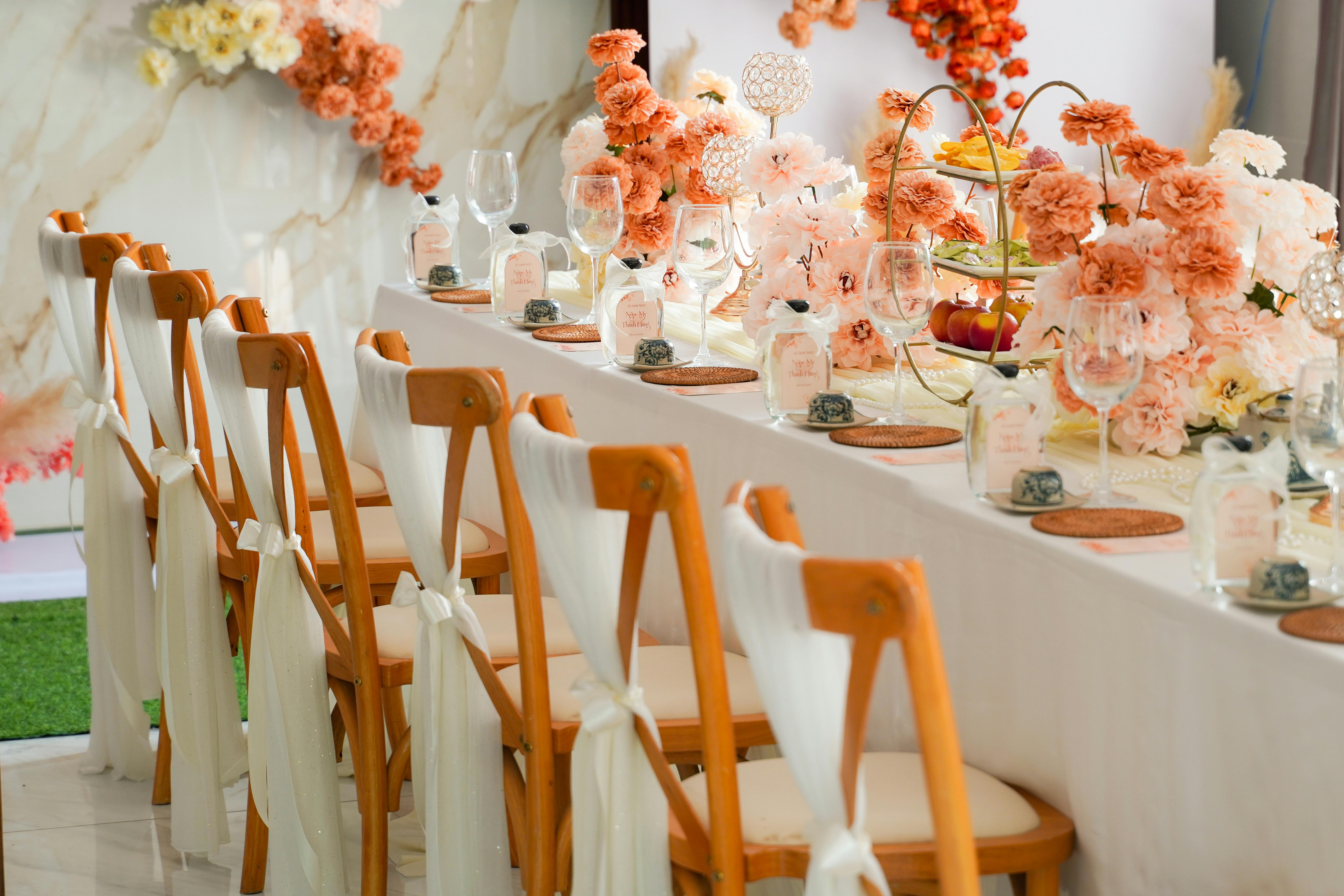 Luxurious wedding reception table featuring exquisite floral arrangements and elegant decor.