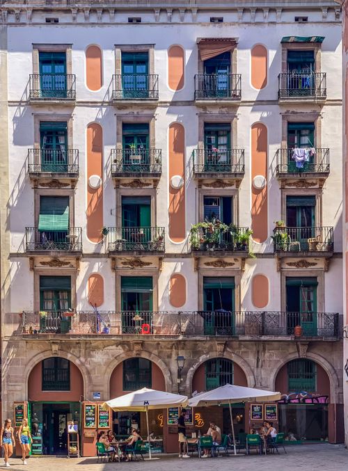 Free Vibrant facade of a historic building with balconies in Barcelona, Spain. Stock Photo