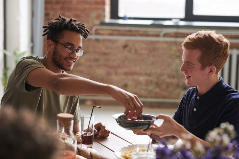Friends sharing a meal — fauxels on Pexels
