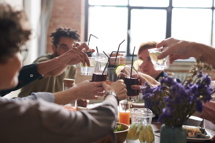 Group Of Person Drinking Indoors