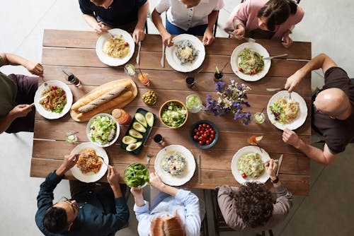 Free Group of People Eating Together Stock Photo