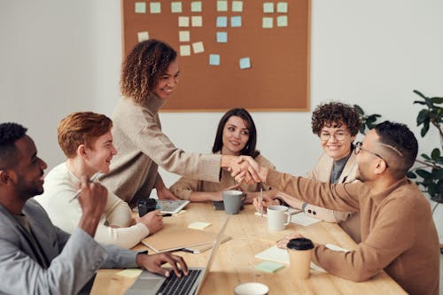 Free Colleagues Shaking each other's Hands Stock Photo