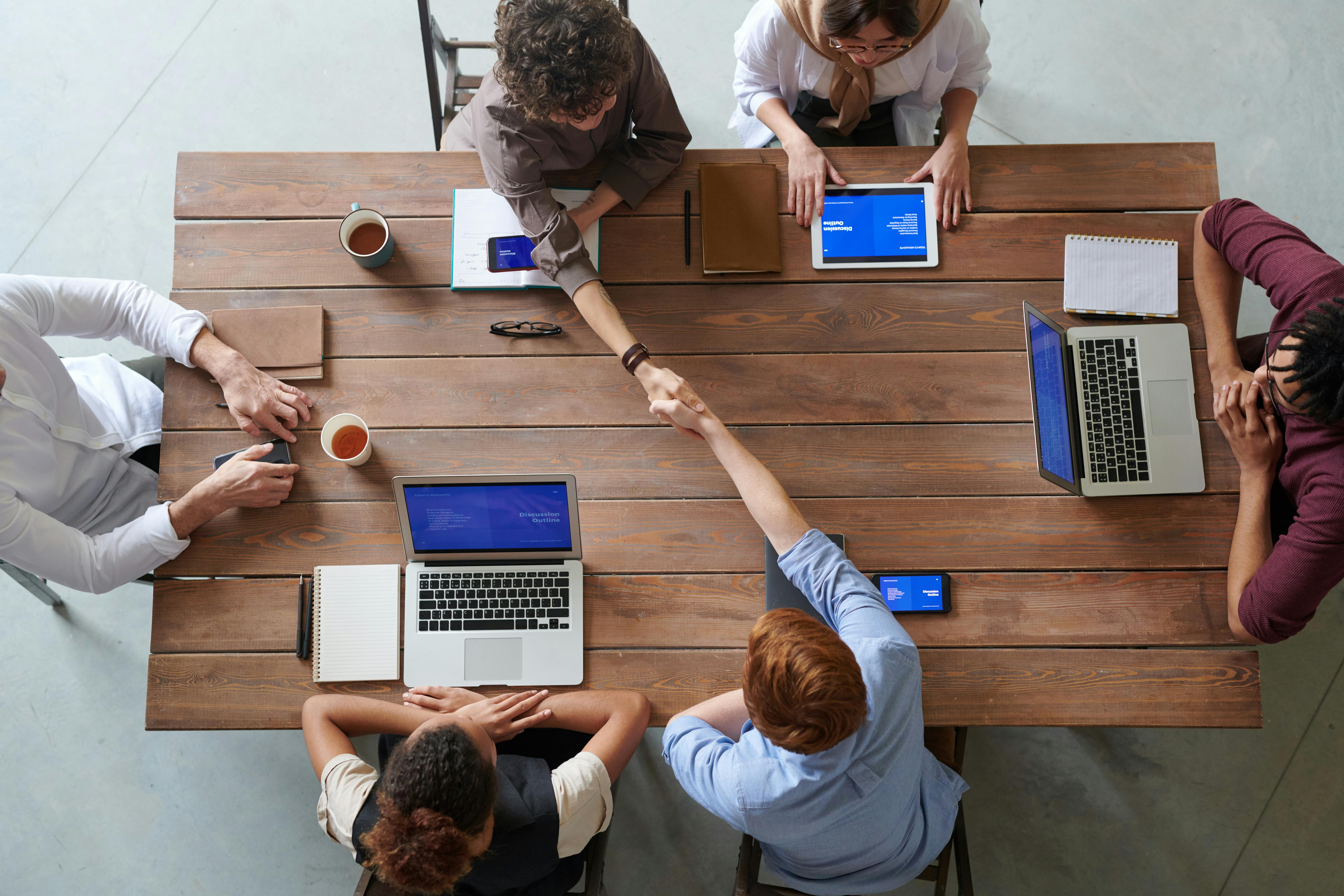 Group sitting around table image