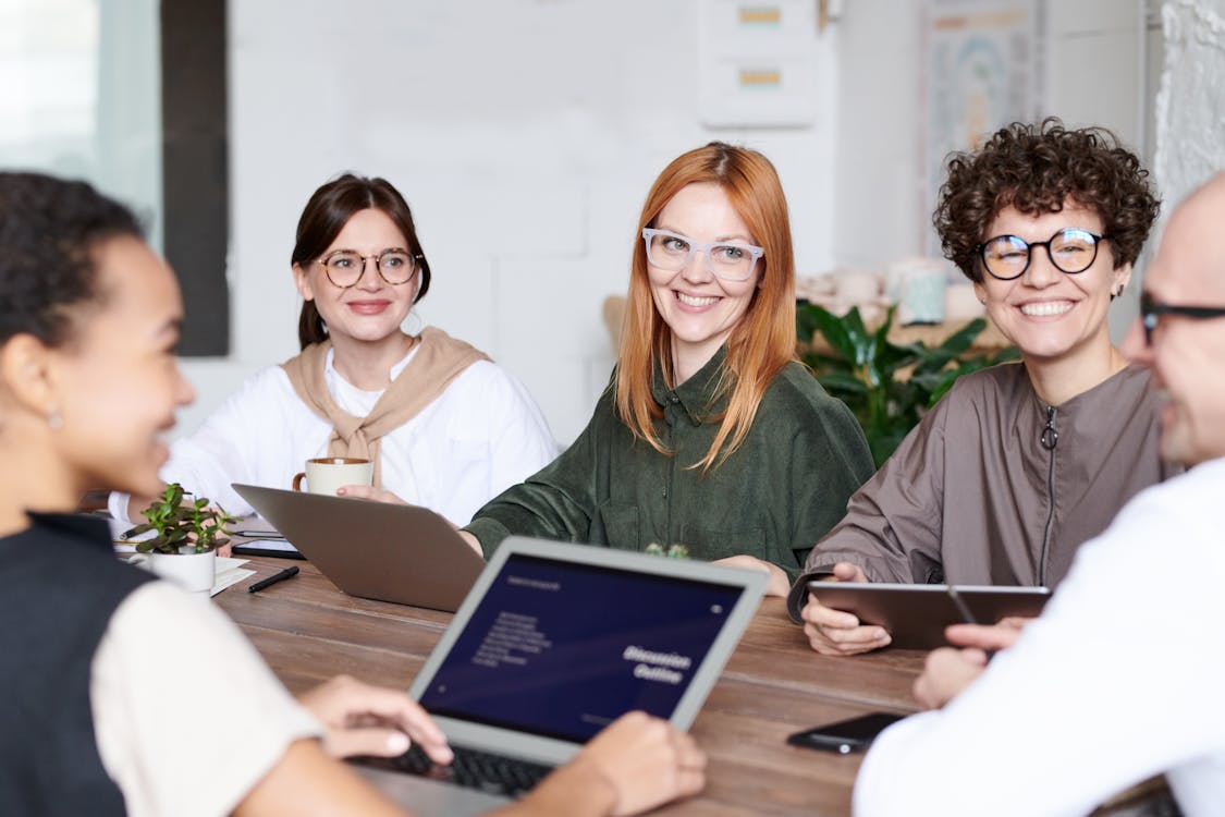 Free Group of People Sitting Stock Photo