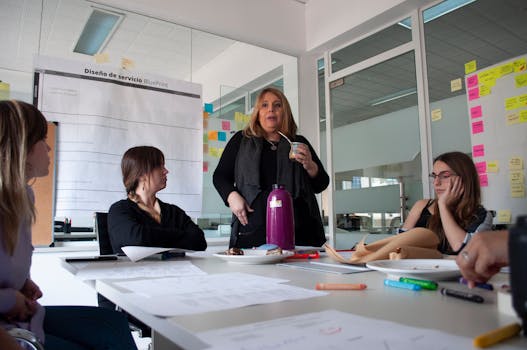Professionals engaged in a collaborative team meeting in a modern Buenos Aires office.