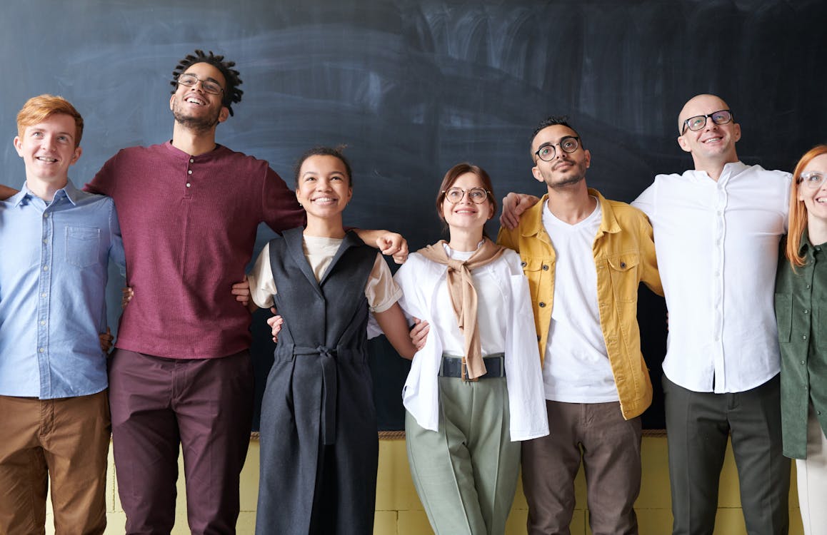 Free People Taking Group Picture Stock Photo