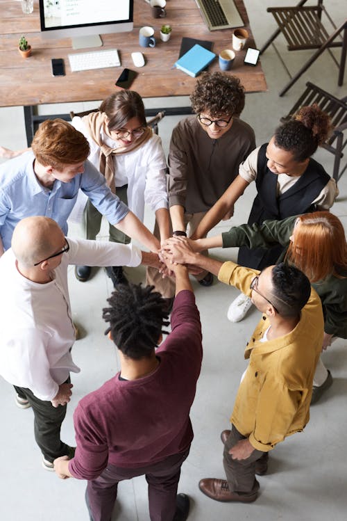 Free Photo Of People Holding Each Other's Hands Stock Photo