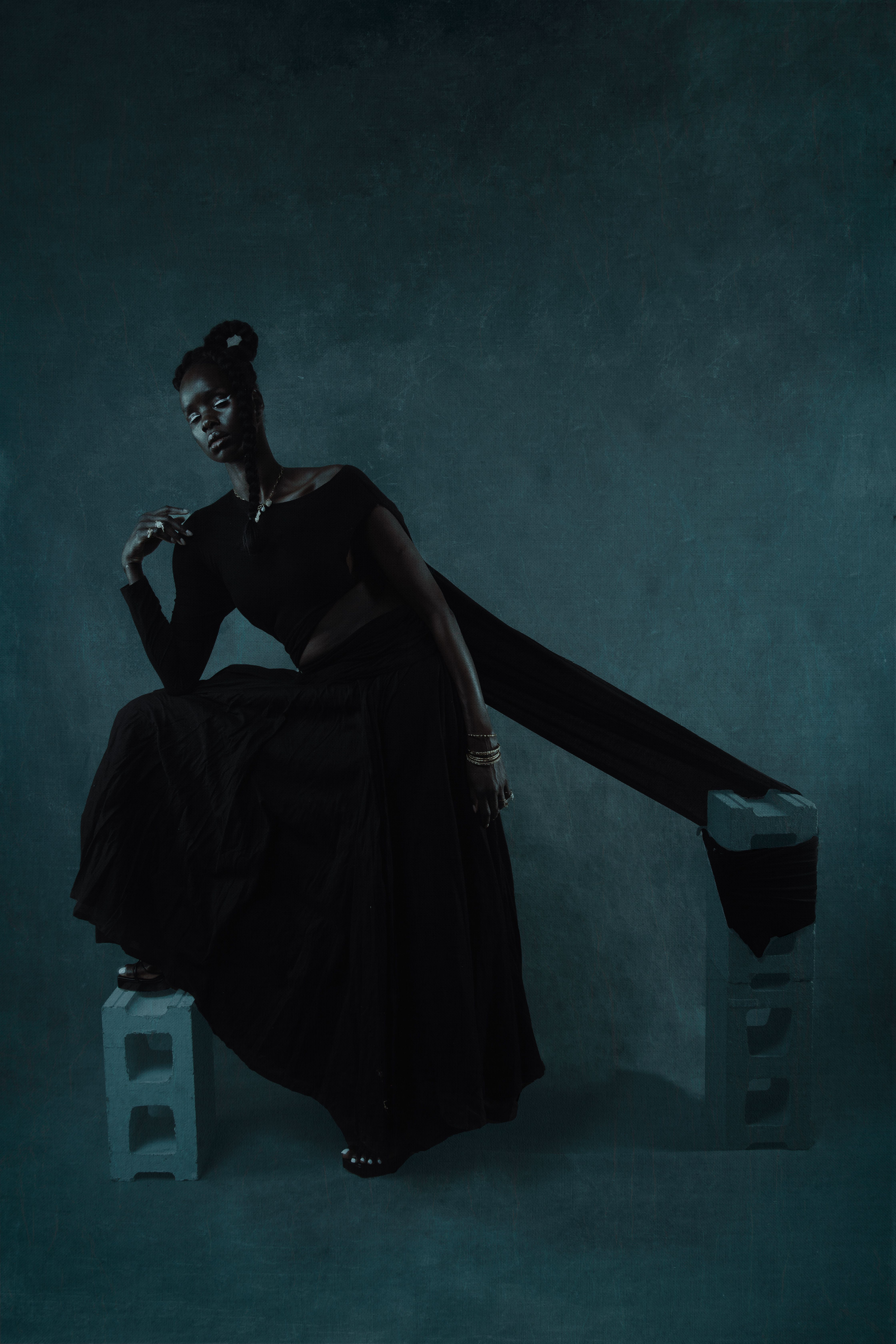 Elegant Portrait of Woman in Flowing Black Dress · Free Stock Photo