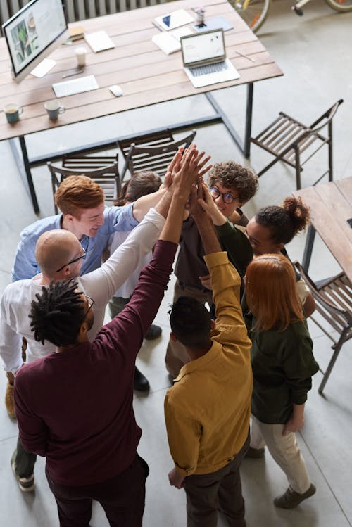 Free Photo Of People Holding Each Other's Hands Stock Photo