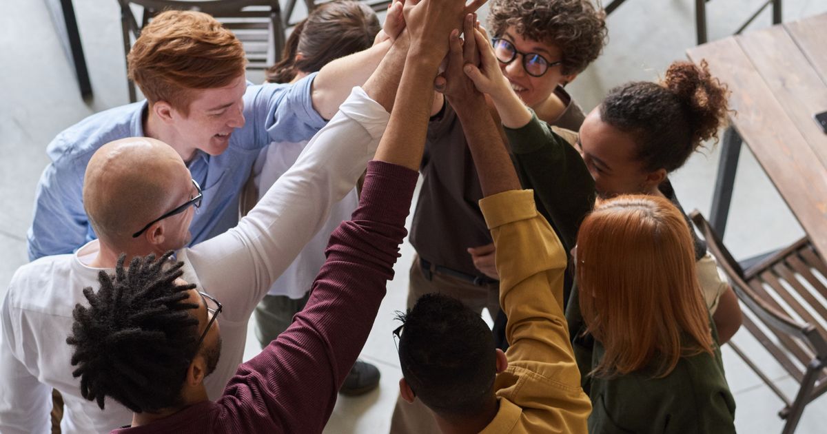 Hiring team reviewing resume details carefully during candidate screening