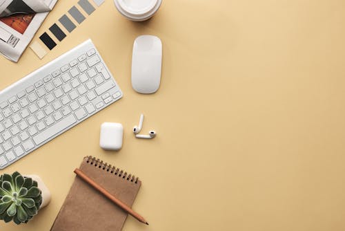 Free Keyboard and Mouse on Beige Background Stock Photo