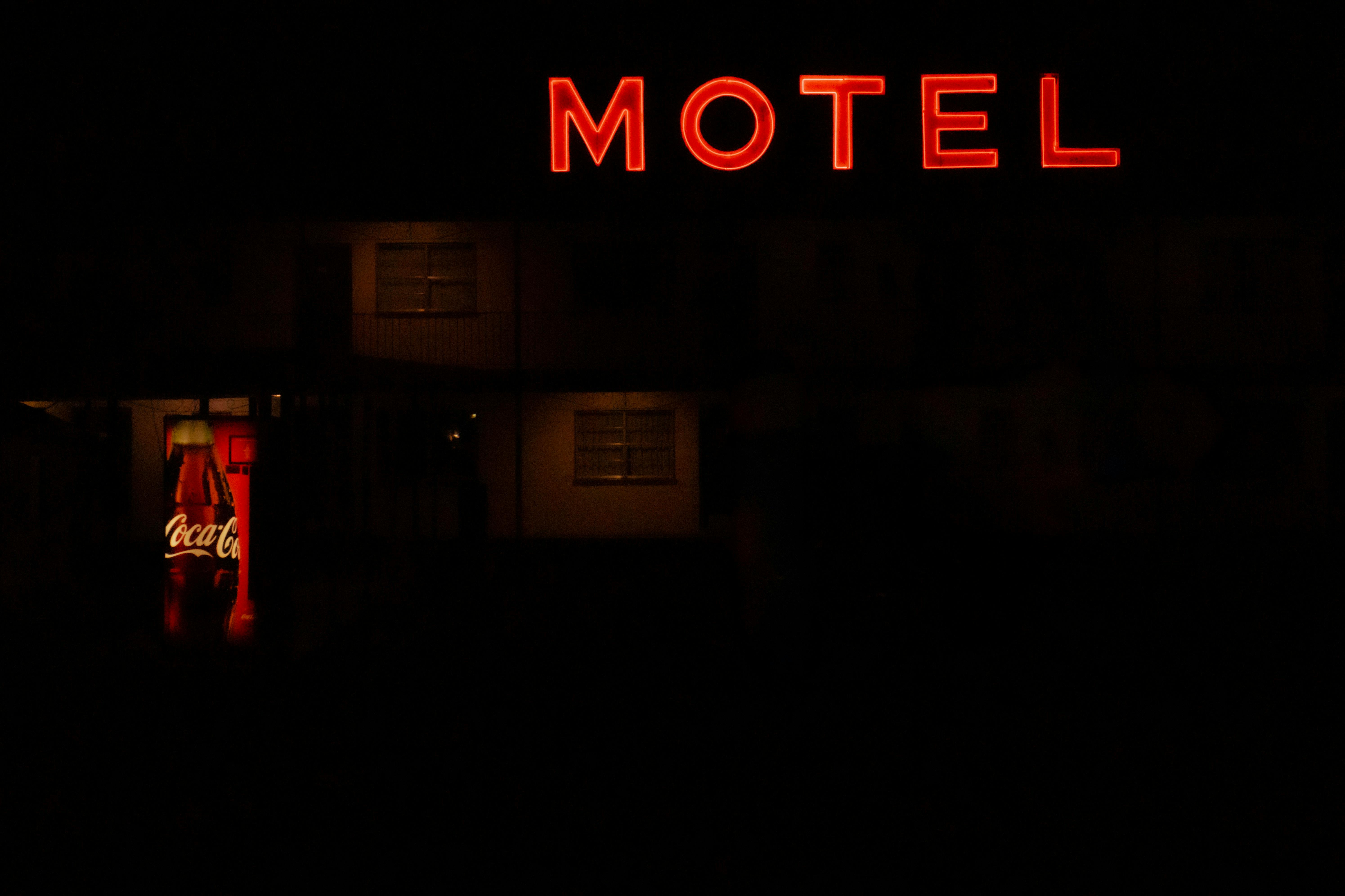 Team reviewing results from an ecommerce product launch campaign around a laptop