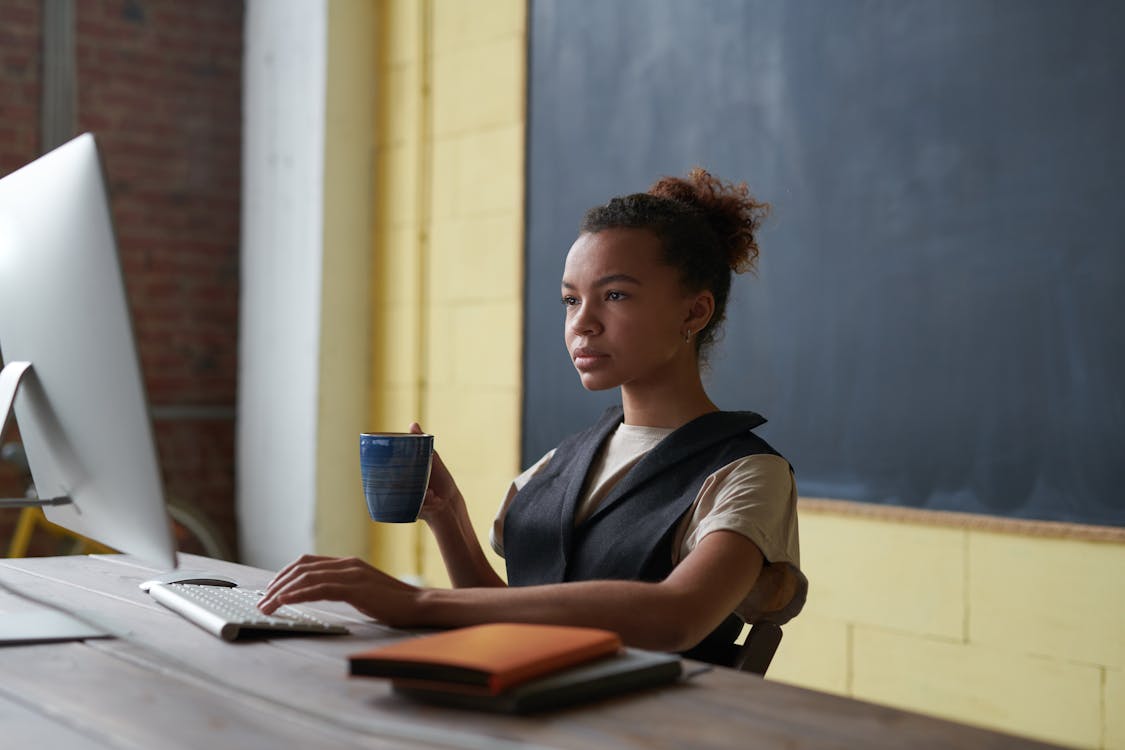 Free Photo Of Woman Holding Mug Stock Photo