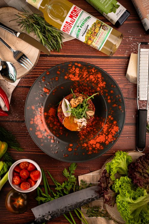 Free Creative overhead shot of a gourmet salad beautifully presented with fresh ingredients, perfect for food photography enthusiasts. Stock Photo