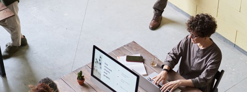 Young professionals brainstorming together in a modern office