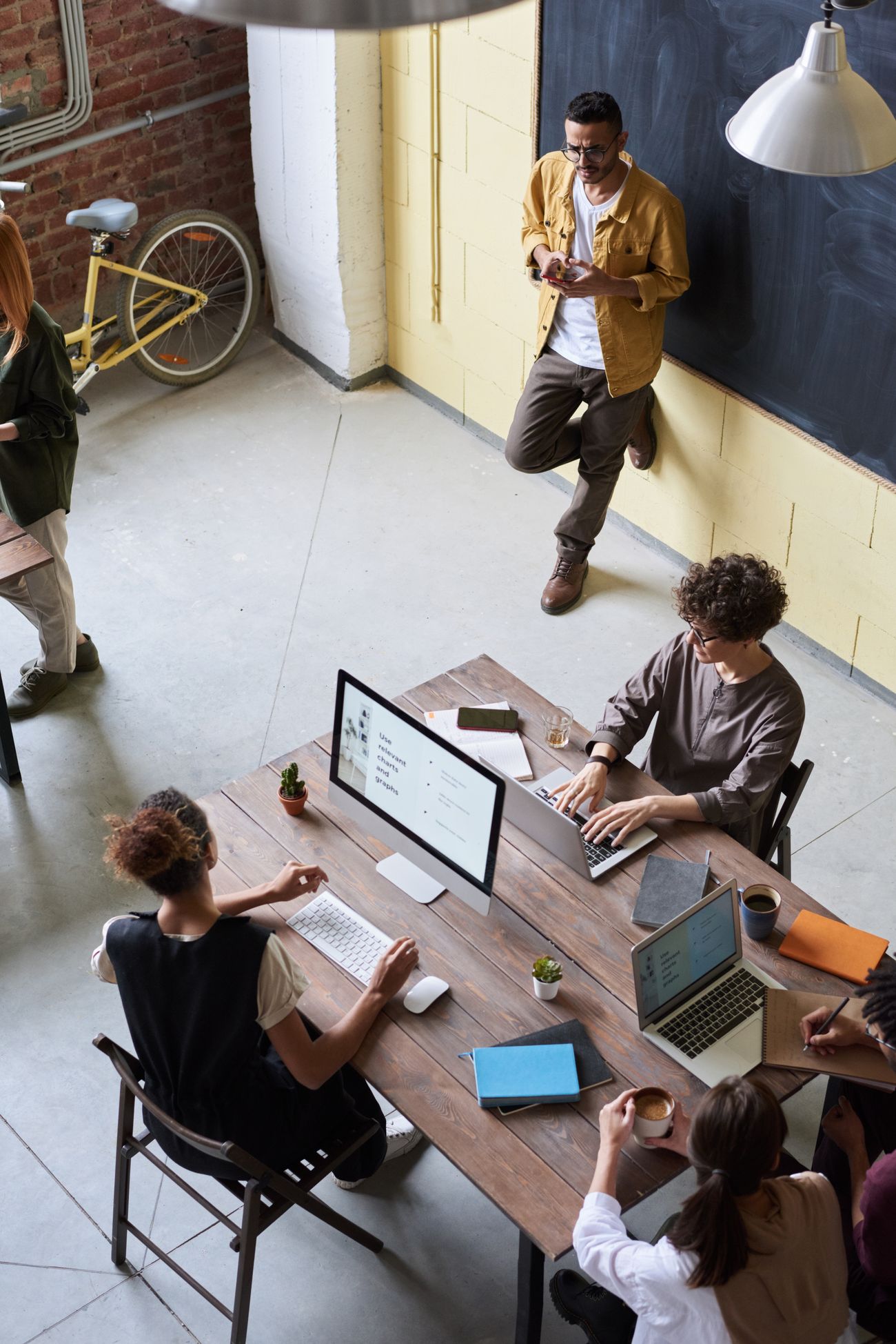 Team brainstorming around a table in a modern office