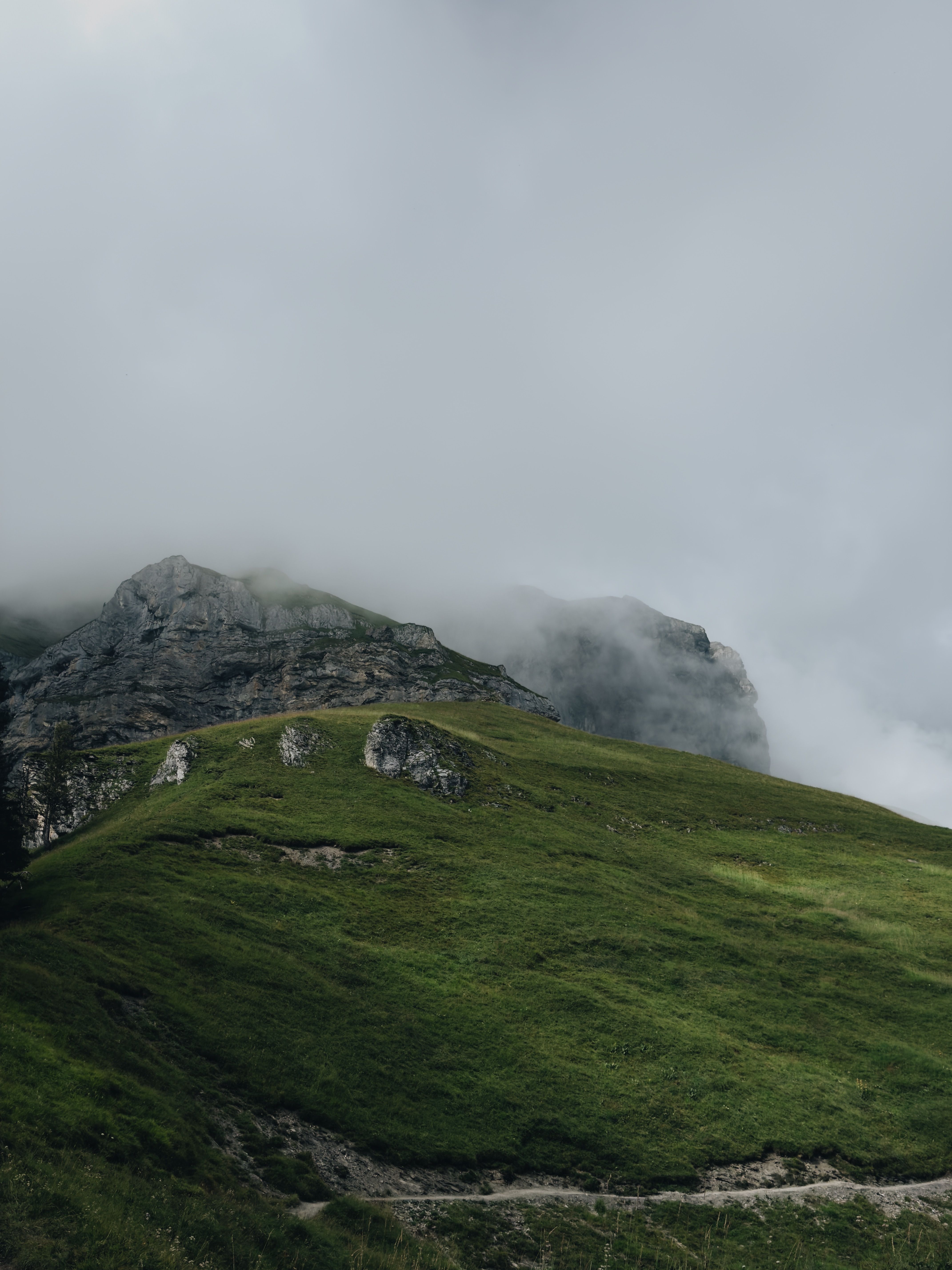 Misty Mountain Landscape with Green Hills · Free Stock Photo