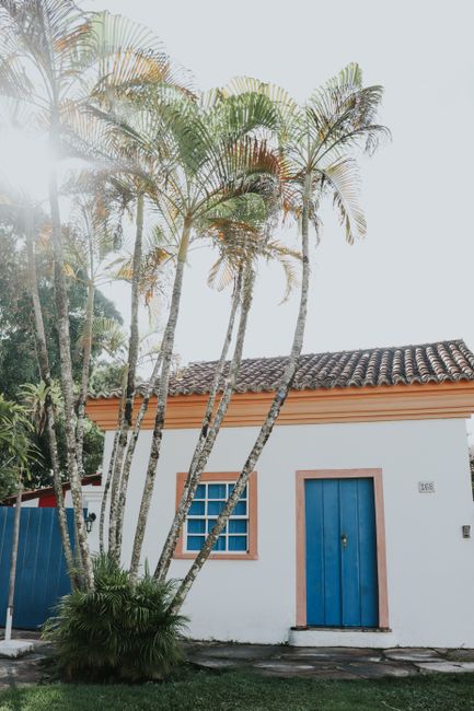 Colonial-style house with palm trees in Porto Seguro, Bahia, Brazil.