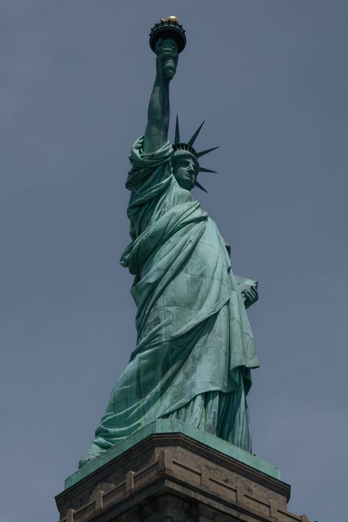 Free Iconic Statue of Liberty in New York, symbolizing freedom and democracy. Stock Photo