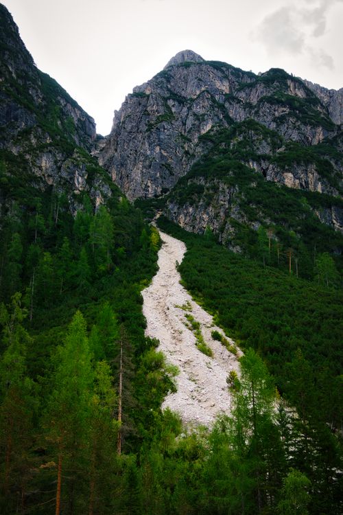 Free Majestic mountain view in Toblach with lush greenery and rocky terrain. Stock Photo