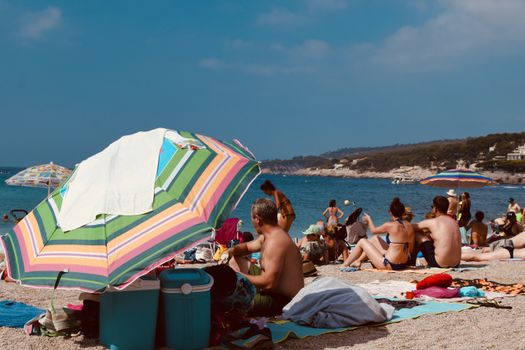 Photo Of People On Seashore During Daytime