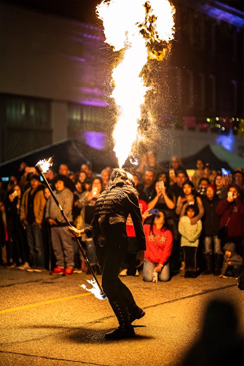 Person Performing A Fire Breath Exhibition