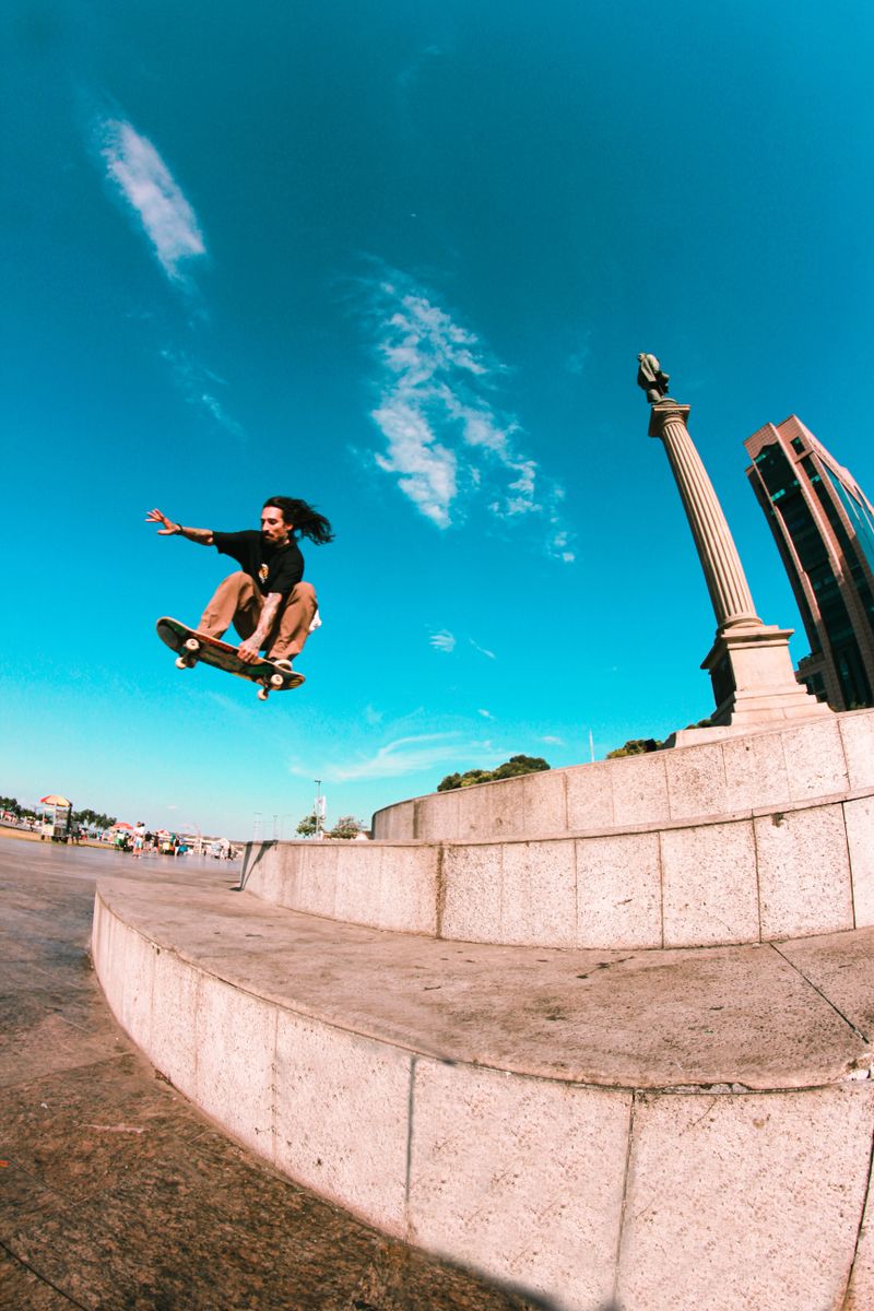 Skateboarder mid-air against an open sky — photo by ALLAN FRANCA CARMO on Pexels