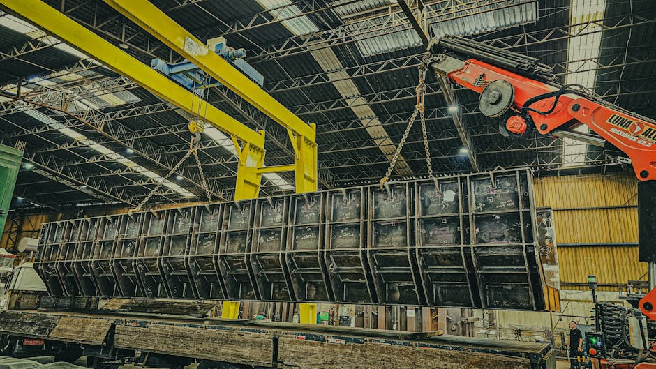 engineers hoisting a large industrial component - component changeout engineers hoisting a large industrial component - component changeout