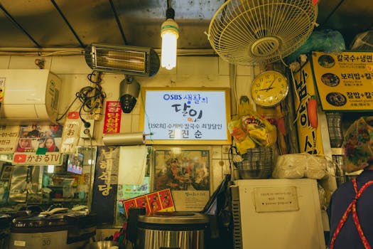A colorful scene inside a traditional Seoul market showcasing Korean culture and food.
